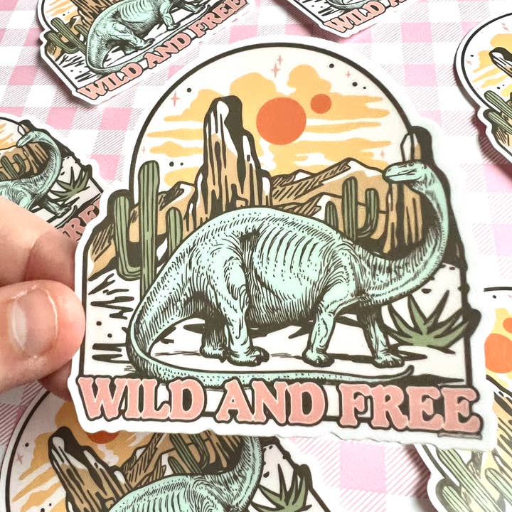 Wild and Free Scifi Dinosaur Retro Cowboy Western Sticker for wholesale by Fox and Brambles