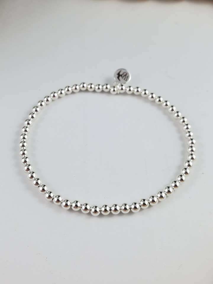 The Mini - 3mm Sterling Silver Accent bracelet for wholesale by Wanderbird