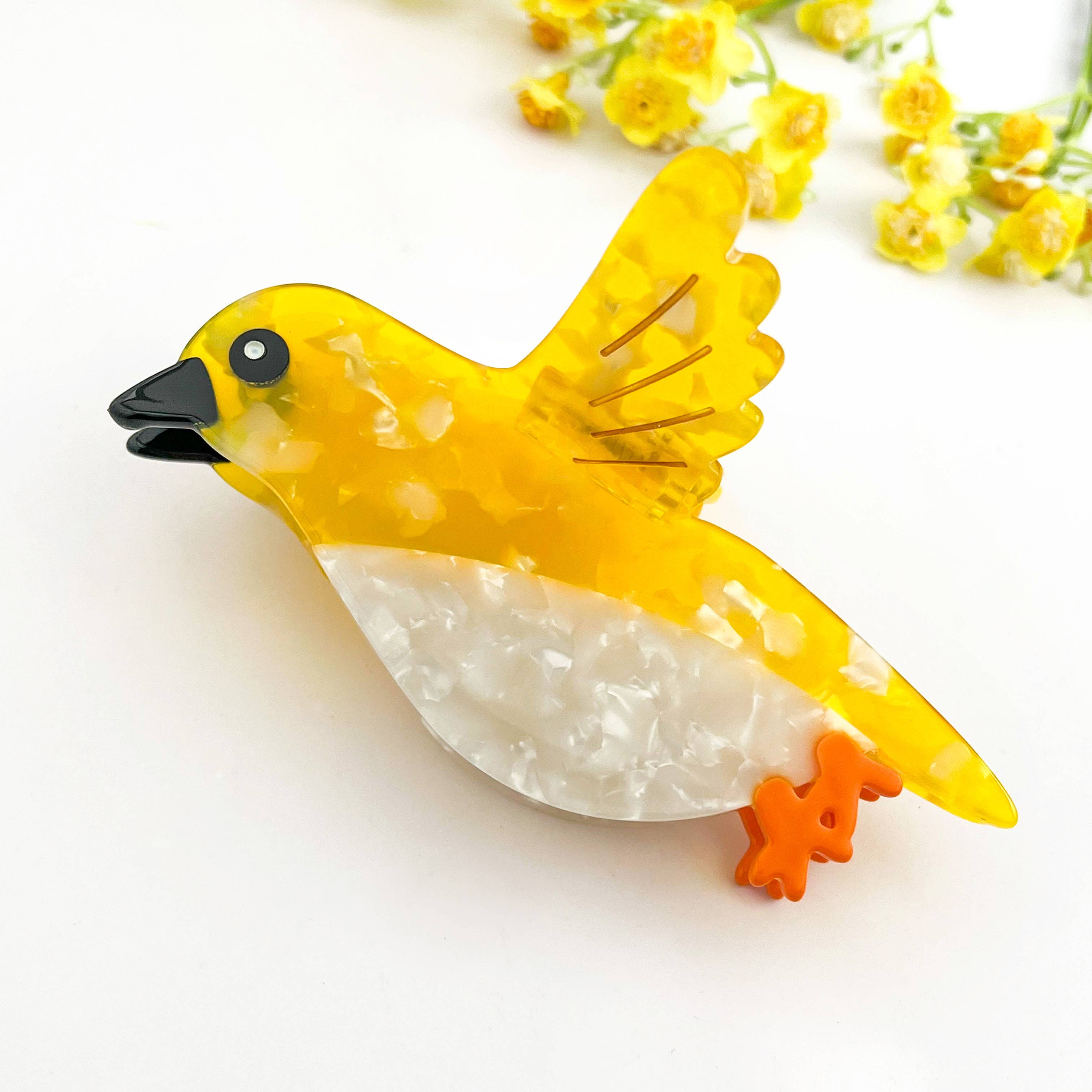 Flying Yellow Oriole Acetate Animal Hair Claw Clip for wholesale on Faire2
