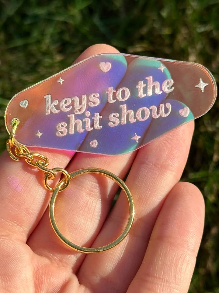 Keys To The Shit Show Motel Iridescent Keychain for wholesale by ShlemonArt