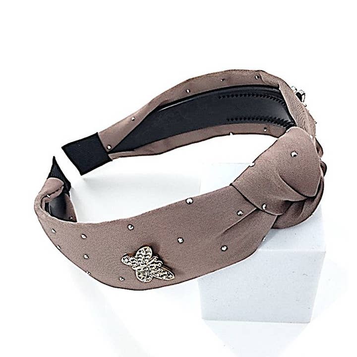 Serre-tête avec charme papillon pour la vente par Atlas Fashion