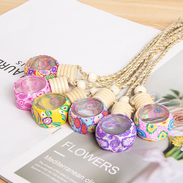 Random Artistic Floral Soft Clay Car Air Freshener Empty Bottle for wholesale on Faire1