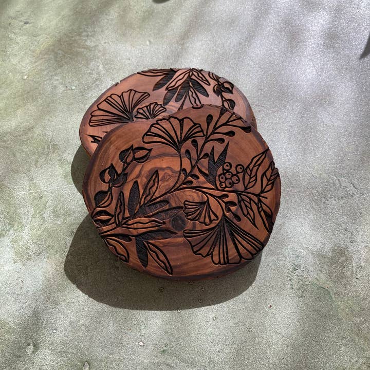 Engraved Olive Wood Coasters - Ginkgo Filigree Design for wholesale by Blu Crescent Engraving