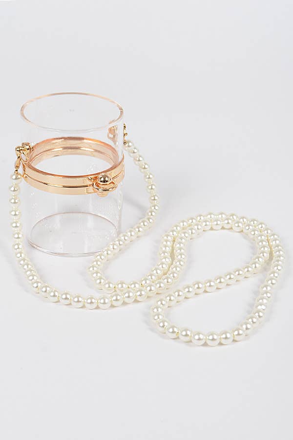 CLAIR Mini pochette à lèvres en plastique transparent en vente sur Faire3