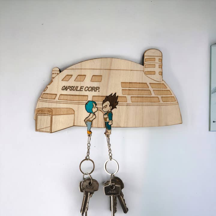 Studio Rima – wholesale Keychain – Unisex – Vegeta & Bulma Capsule Corp Keychain Wall Mounted Key Holder