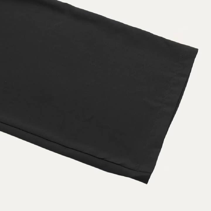 Noir Combinaison Grace noire transparente à col en V et manches longues et jambes larges en vente sur Faire5