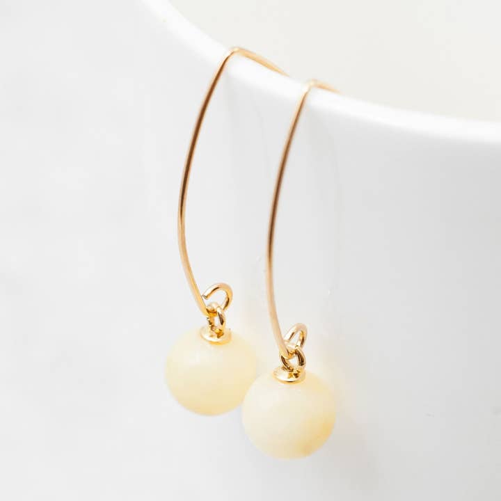 Orecchini lunghi in ambra baltica, orecchini a goccia in argento e oro per la vendita all'ingrosso da parte di Marcin Waryszak