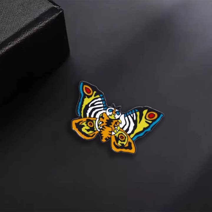 Vibrant Mothra: Artsy Enamel Butterfly Pin for Trendsetters for wholesale by Magnifique Hearts