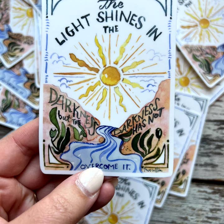True Cotton - Wholesale Sticker - Boho Christian Scripture Sticker - John 1:5 sun mountains True Cotton1