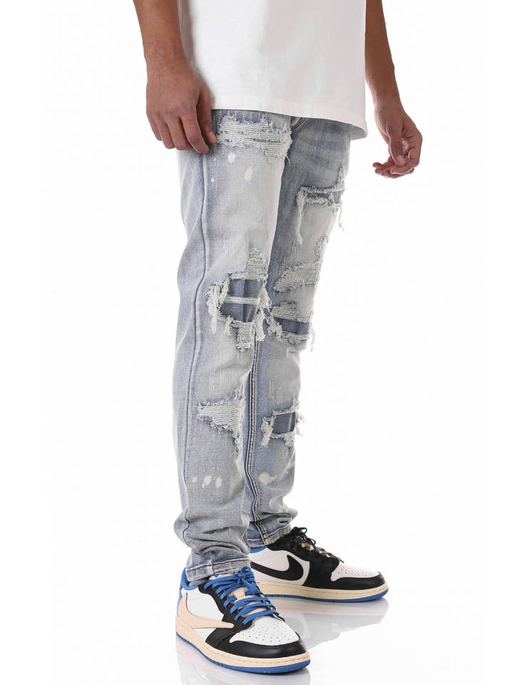 M BLUE RIP & REPAIR JEANS for wholesale on Faire