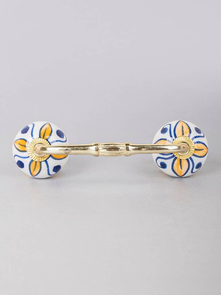 Handmade Round Shape Yellow Flower on Off White Base | Hand painted Design Ceramic Cabinet Pull |Furniture Door Ceramic Pulls for wholesale by KNOBCO