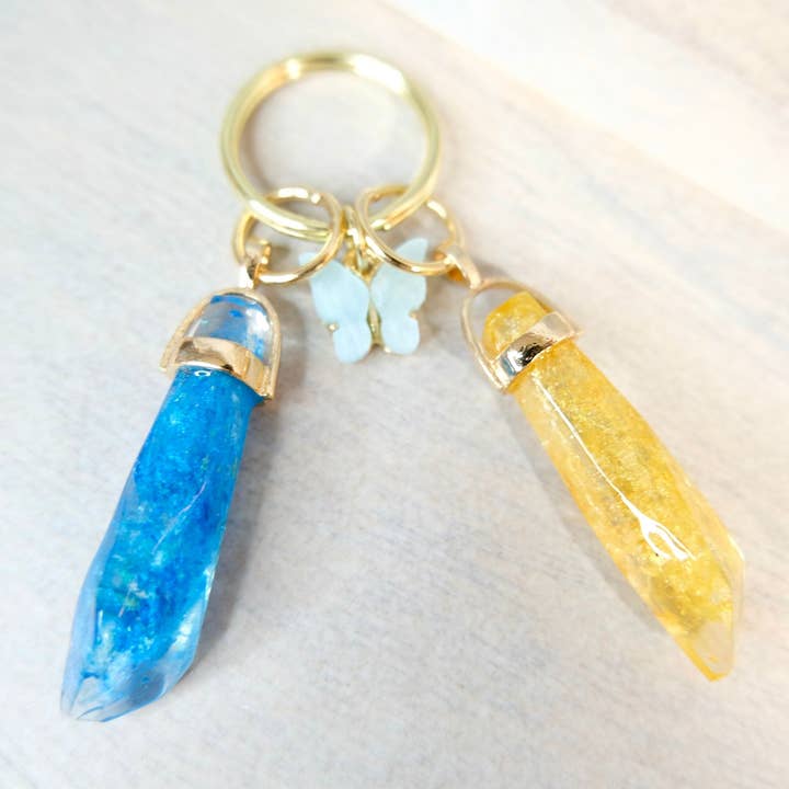 BlueButterflyBazaar - Wholesale Keychain - Women's - Yellow and Blue Reylo Ben Solo and Rey and Blue Butterfly Kyber Crystal keychain Star Wars, unique gift, collectable.4