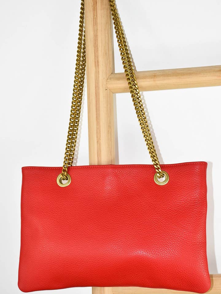 Pochette in pelle rossa Carmilla per la vendita all'ingrosso da parte di Marli