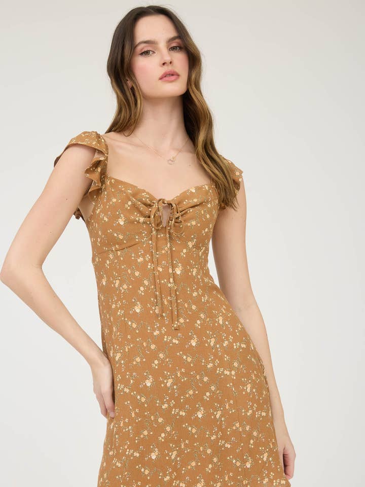 ROBE COURTE À DÉCOUPE FRONTALE FLORALE AVEC NŒUD pour la vente par The Workshop Studio