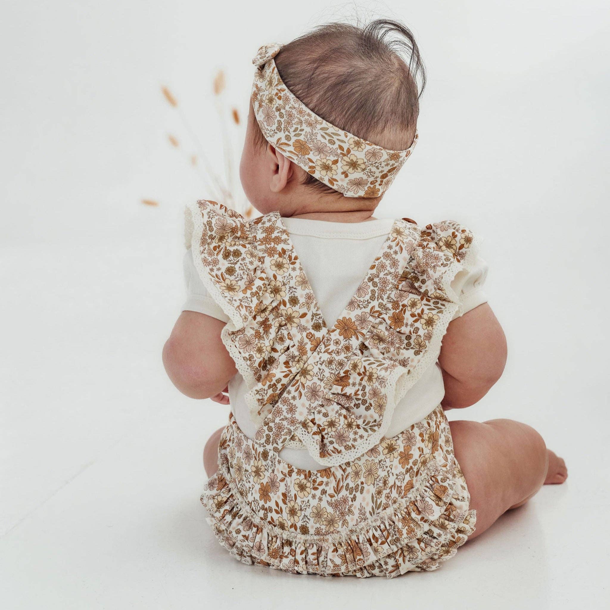 Natuurlijk Bailey Bloemige Flutter Jumpsuit voor groothandel op Faire2