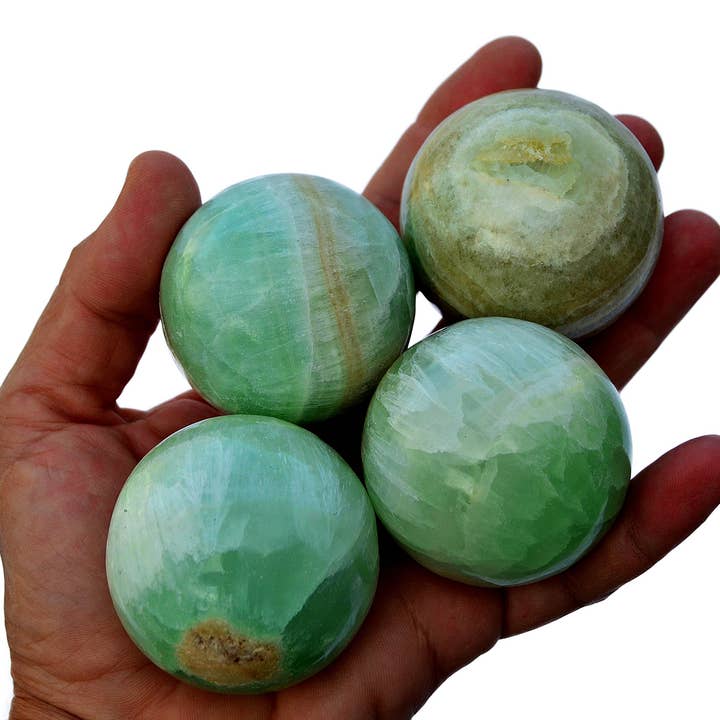 Kaia & Crystals - Wholesale Spiritual Stone/Crystal - Pistachio Calcite Spheres 1 Kg (3-6 Pcs) - (40mm - 60mm)