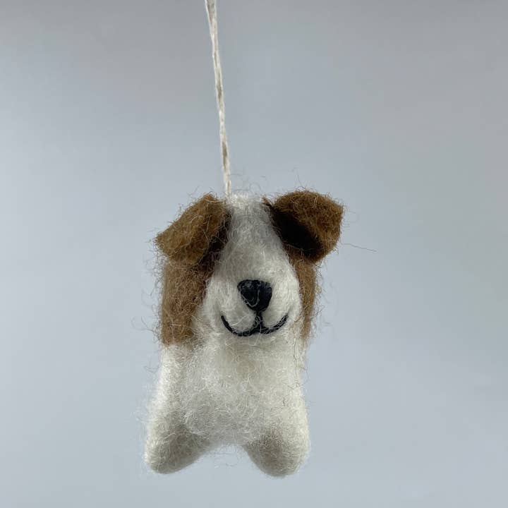 Handmade Cute Felt White and Brown mix Dog Keyring and other Purchase Wholesale dog ring. Free Returns & Net 60 Terms on Faire trending on Faire.