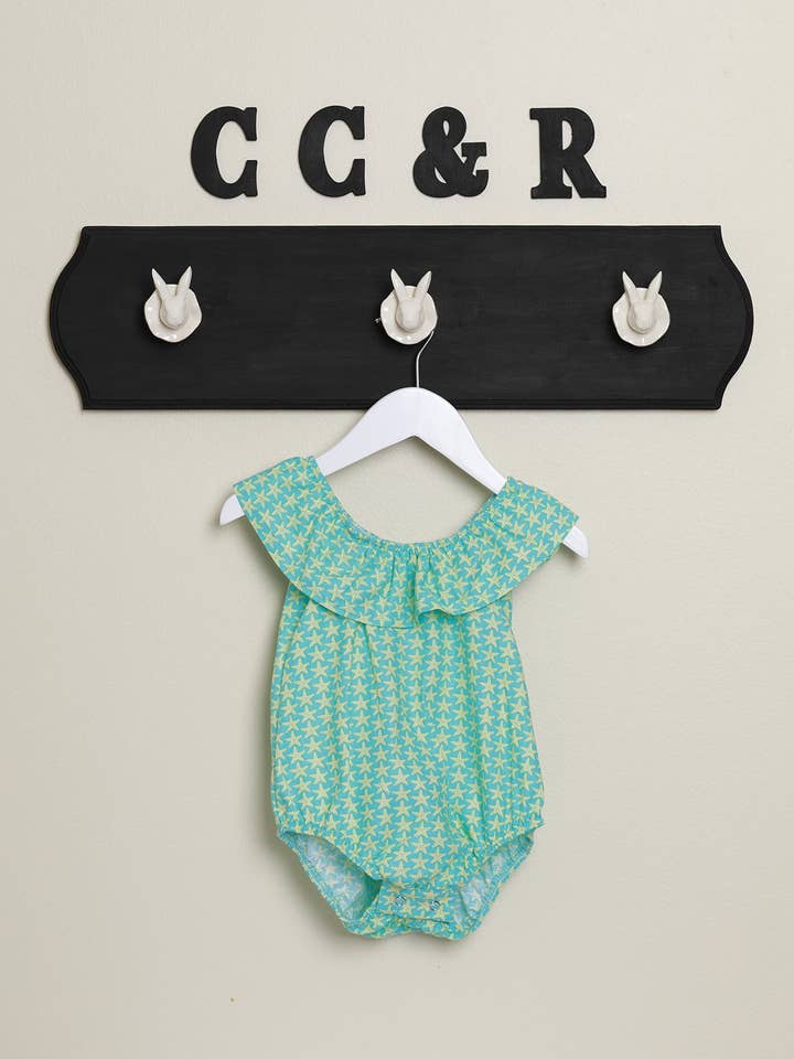 Sea Stars Aqua Combinaison col volanté pour la vente par cee cee & ryan