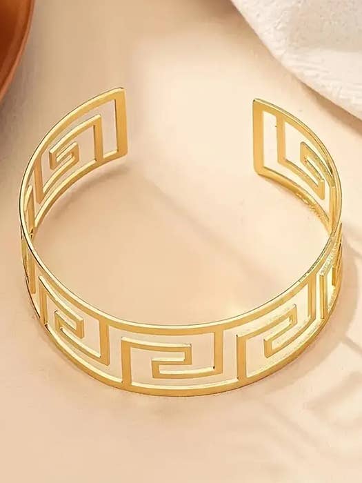 ( G633 ) RETRO HOLLOW METAL BANGLE BRACELET for wholesale by Jewelry Max