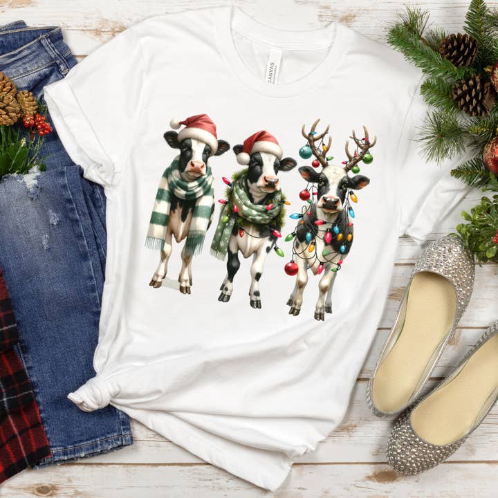 Cow Christmas light Graphic T-shirt for wholesale by Shells Primitives/No Place Like Home