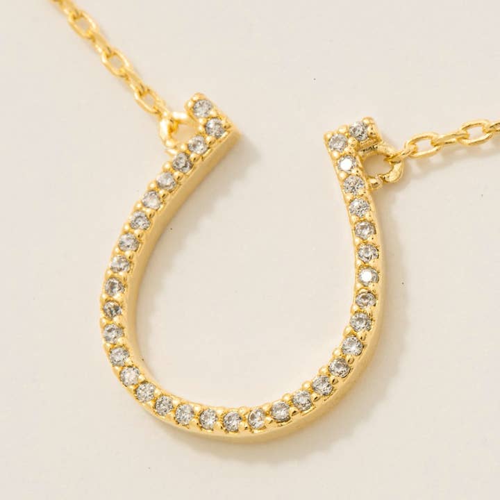 Fame Accessories - Vente Colliers à pendentif - Collier pendentif fer à cheval pavé de zircons plaqué or2