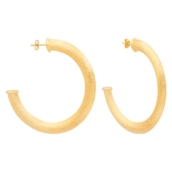 RASA HOOP EARRINGS -S / M / L and other Purchase Wholesale rasa. Free Returns & Net 60 Terms on Faire trending on Faire.