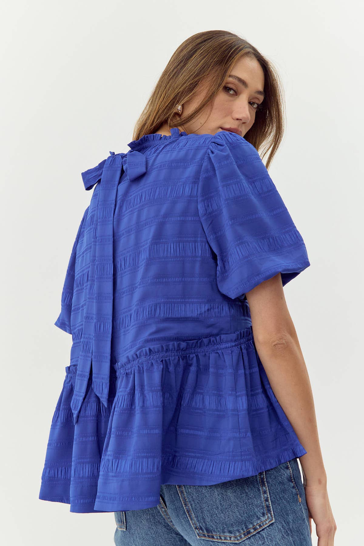 Cobalt Lou Peplum Top for wholesale on Faire1