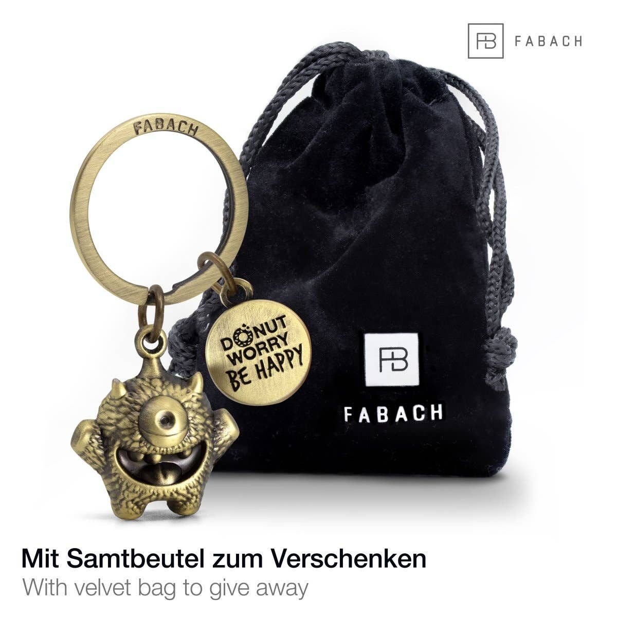 FABACH – Die Schlüsselanhänger-Schmiede – Porta-chaves - Unissexo por atacado – Chaveiro 'Cyklops' de incentivo – monstrinho sorteado com gravação 'Donut worry, be happy!' – amuleto da sorte Kummermampfer2