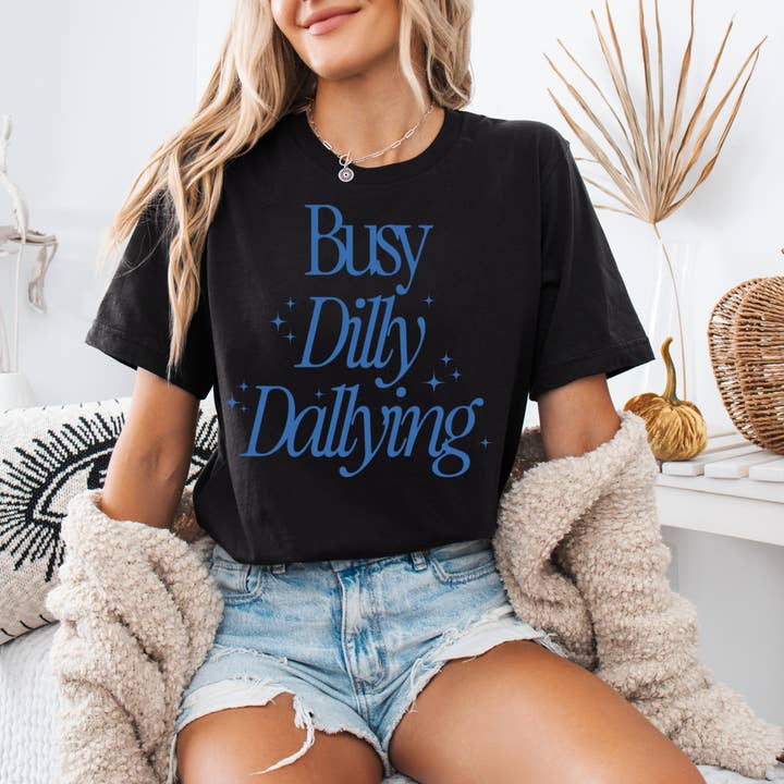 Busy Dilly Dallying Graphic Shirt or Sweatshirt for wholesale by Sam & Seb Co.