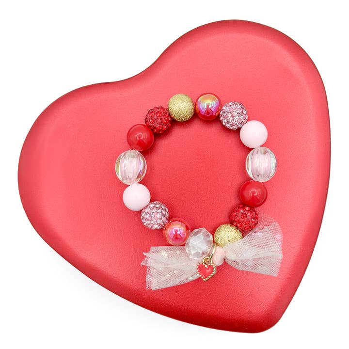 Girls’ Valentine’s Bracelet with Heart Charm and Tulle Bow for wholesale by Peach Tree & Co.