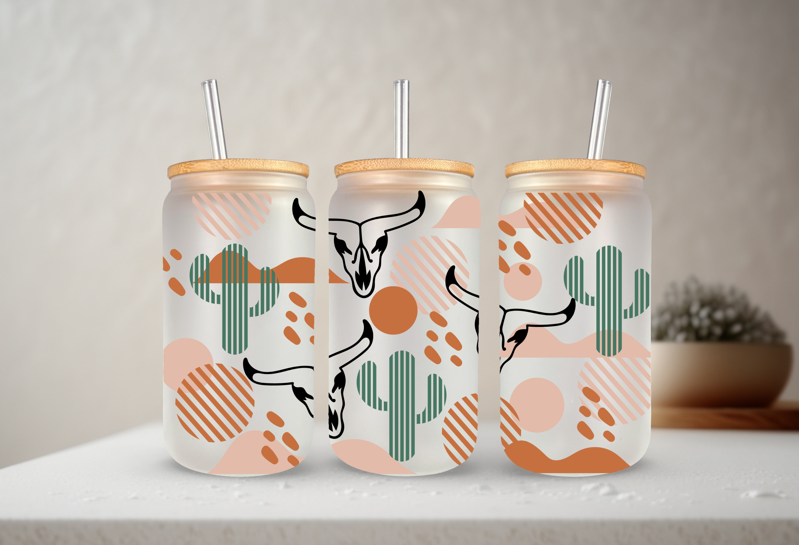 SKS Design Studio – wholesale Drinking glass/cup – Western | UVDTF | 20 oz Libbey Can Glass with Bamboo Lid & Straw1