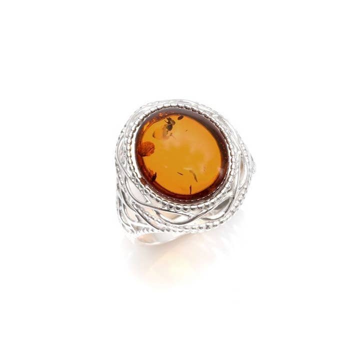 Natural oval Baltic cognac amber ring, sterling silver for wholesale by OPALOOK France
