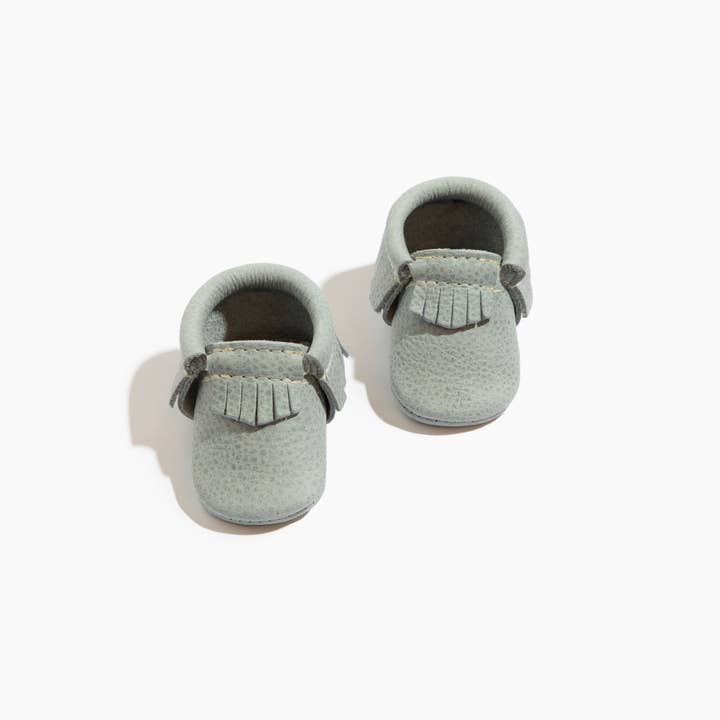 Newborn Greatest Snow on Earth Moccasin Baby Shoe for wholesale by Freshly Picked