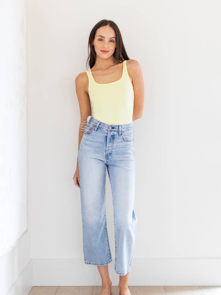 Hannah Bodysuit in Lemoncello for wholesale by PRIV Collections