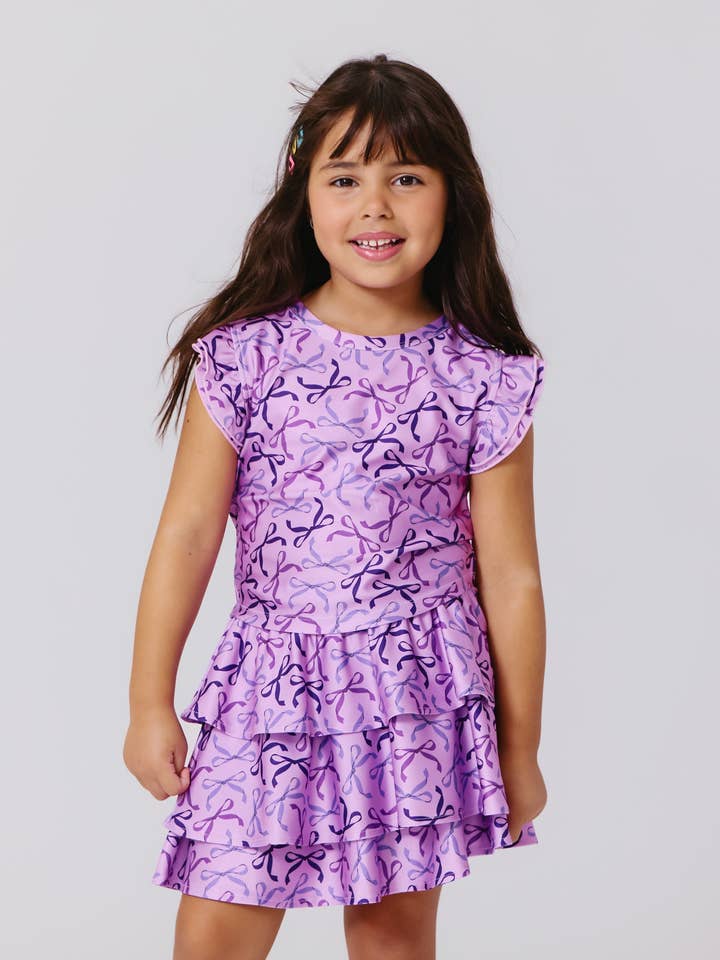 Girls Hi-Shine Ruffle Crop Top in Purple Bows for wholesale by Terez