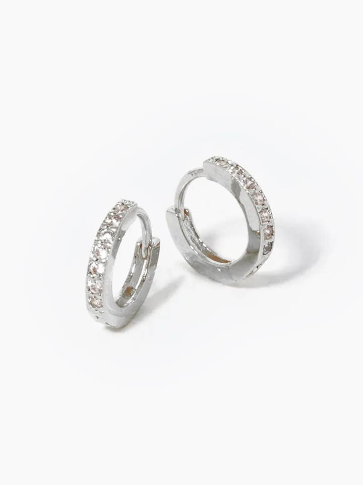 White Gold Dipped CZ Pave 10mm Huggie Hoop Earrings for wholesale by Wild Honey
