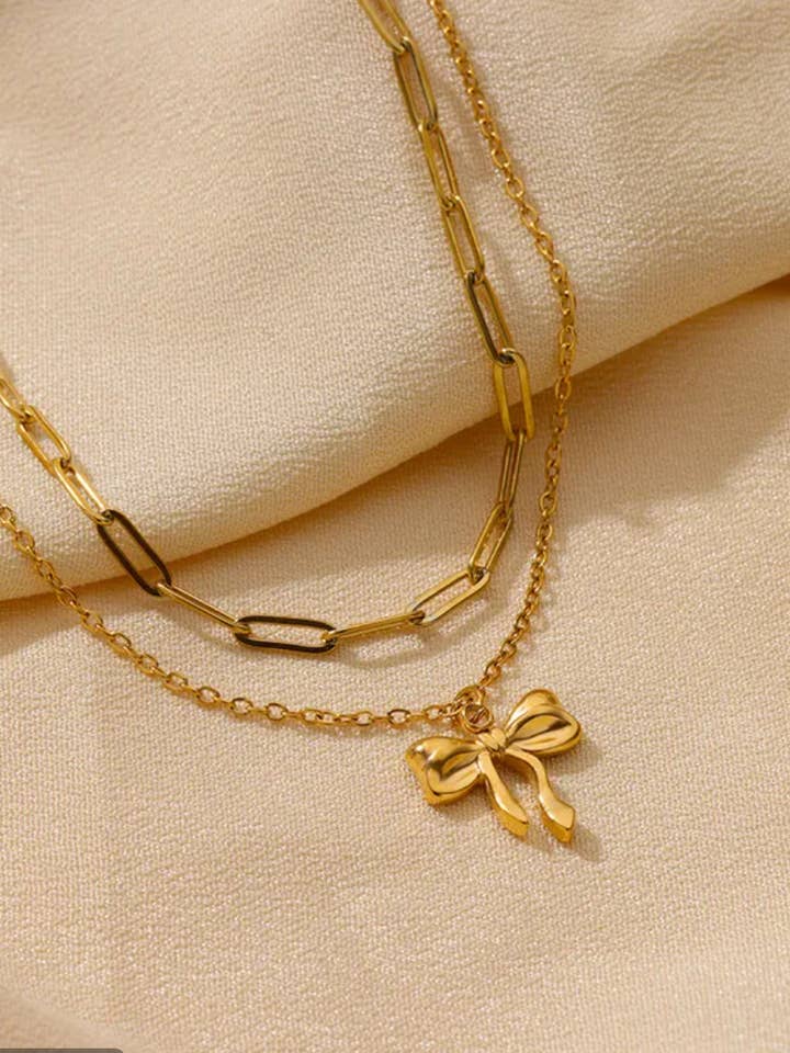 Collier Chaîne à Nœud Papillon en Or à Couches Multiples pour la vente par Offshore Surf Co