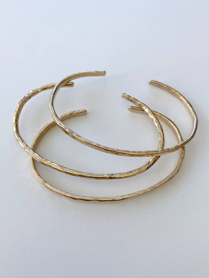 Set of Hammered Brass Cuffs for wholesale by Free & Fleeting