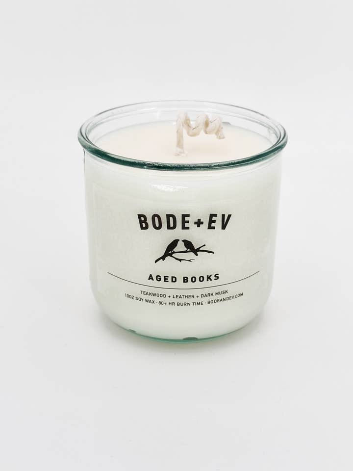Aged Books | Leather & Wood Soy Candle + Room Spray for wholesale by Bode+Ev