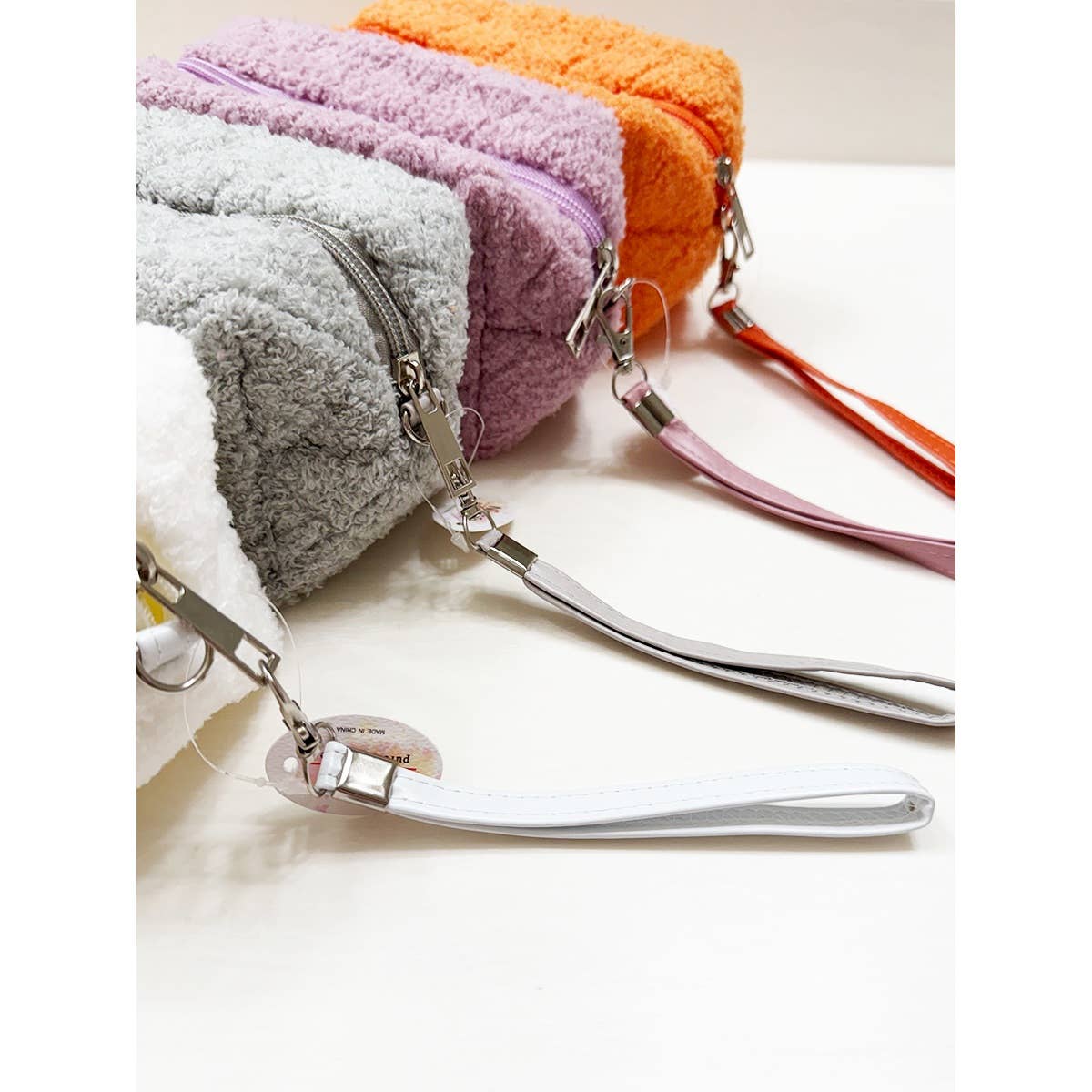 MIX COLOR Soft Plushie Teddy Cloth Light Weight Cosmetic Bag for wholesale on Faire5