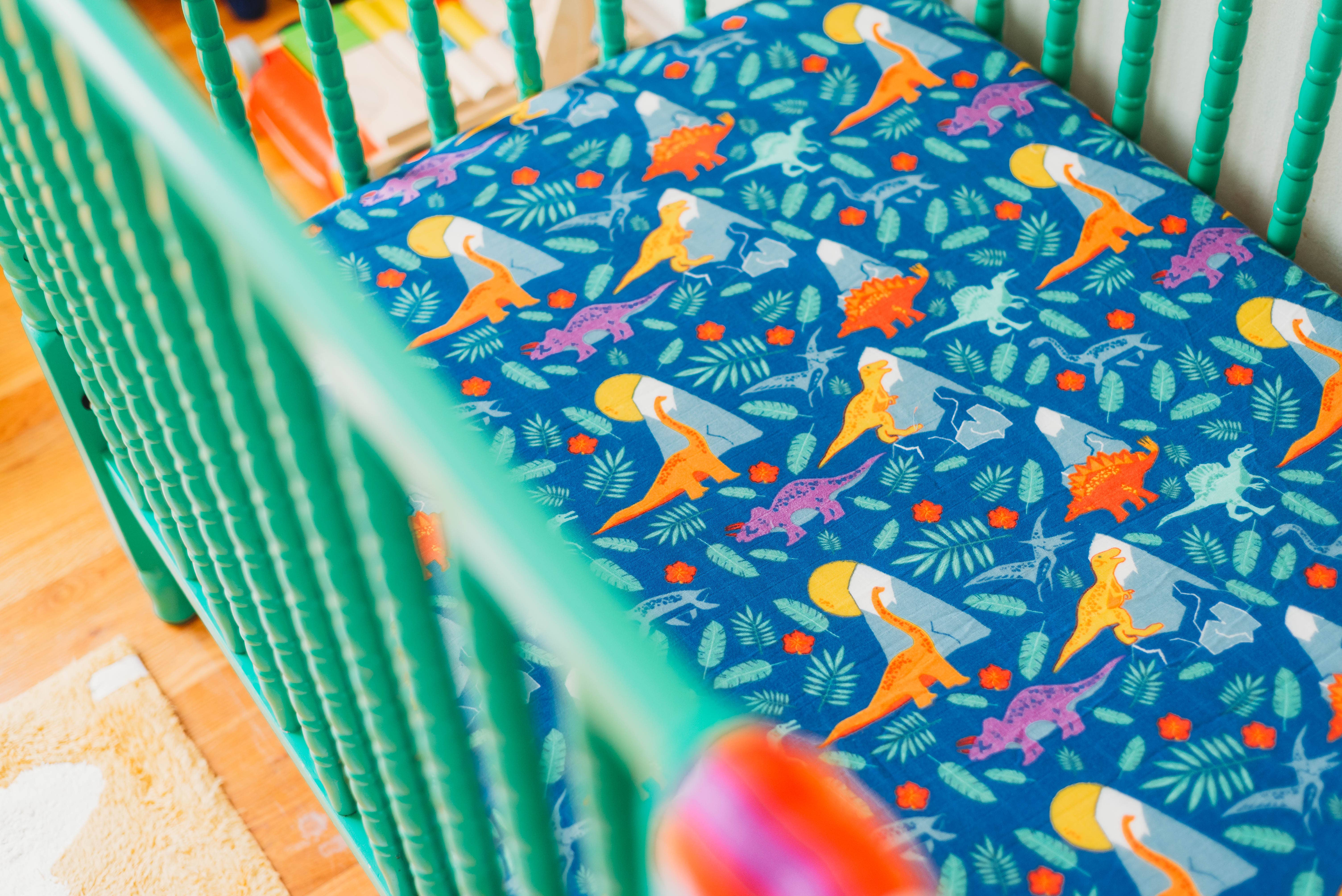 Oliver + Kit - Wholesale Cot/Crib Sheets - Rainbow Dino Fitted Crib Sheet0