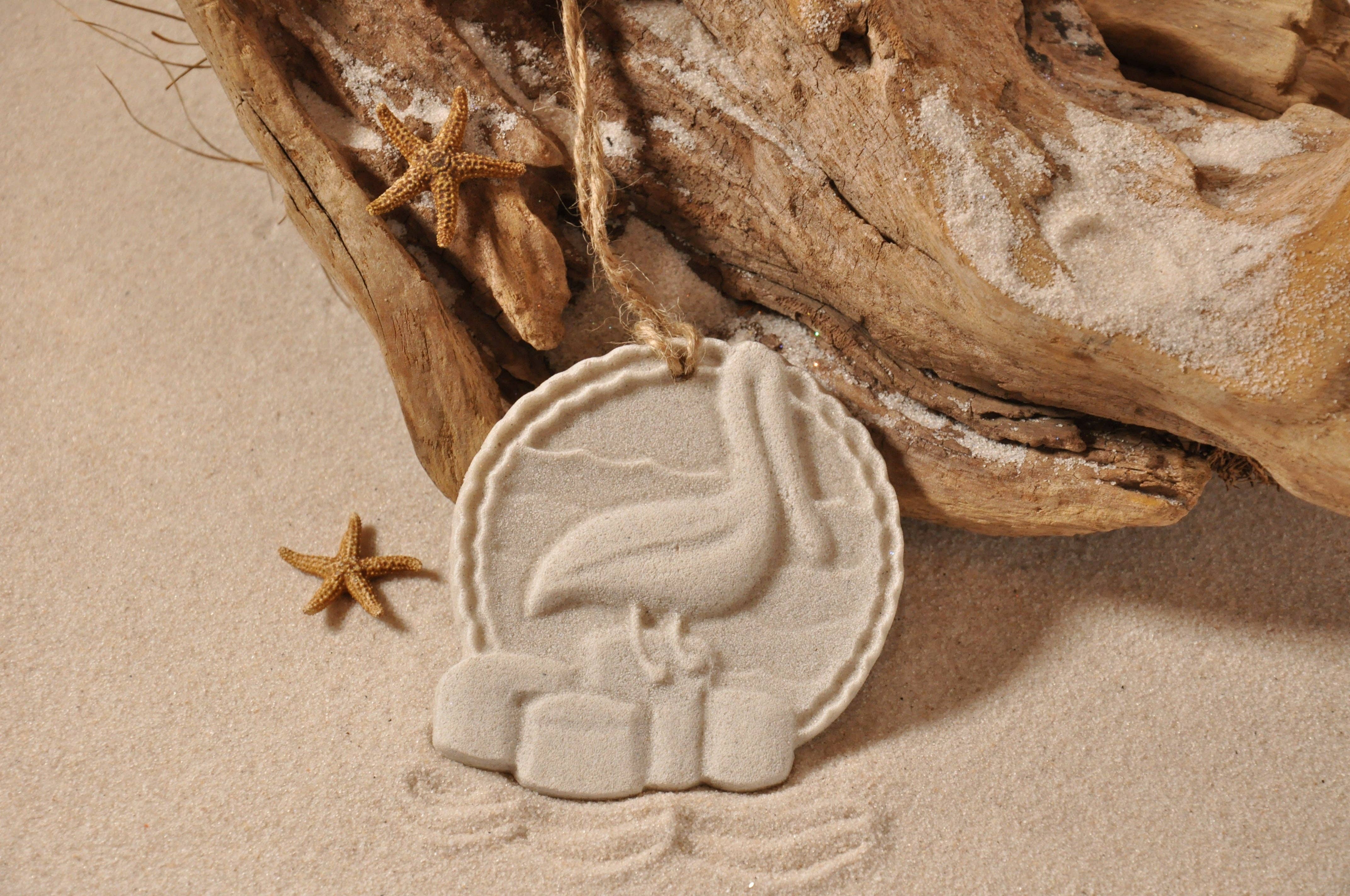 The Sand Store by Creative Artworks, Inc. – wholesale Ornament – Pelican Sitting on the Dock Sand Ornament1