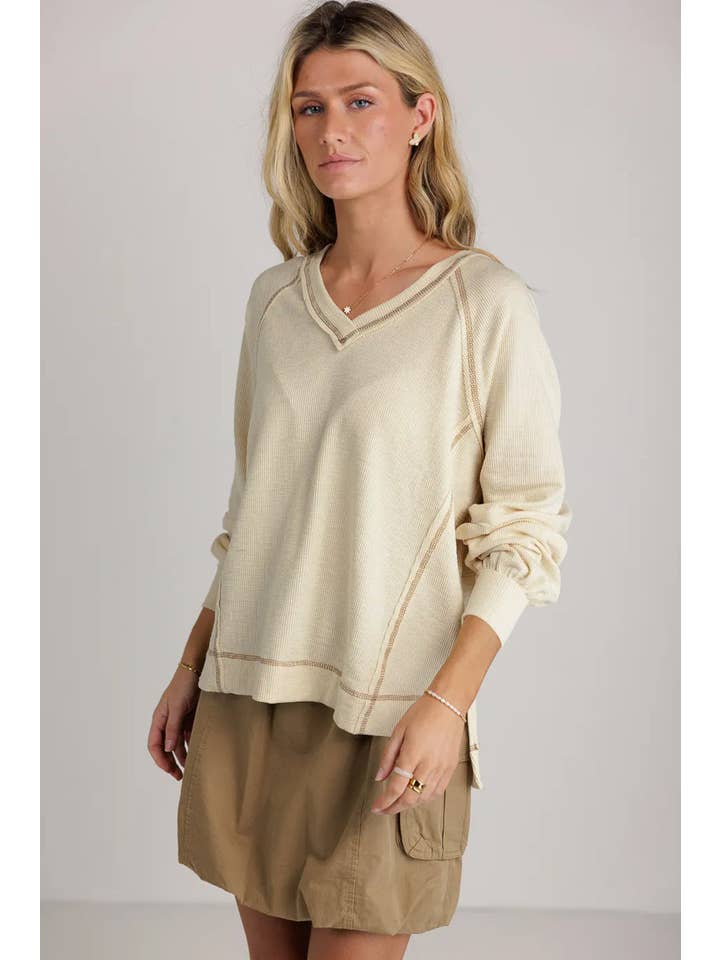 Beige Exposed Seam Textured Knit V Neck Pullover Top for wholesale on Faire