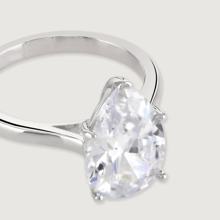 The Carat Collection - Pear Solitaire Ring for wholesale by Buckley London