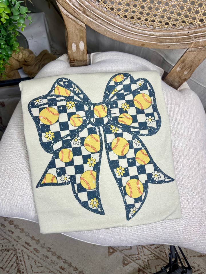 Bow with Softball Checkered Print (Gildan Sublimation Tee) for wholesale by It's A Tee Party