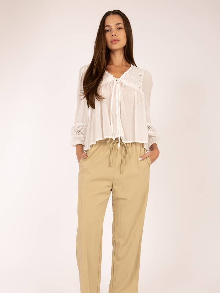White EYELET TRIM BLOUSE for wholesale on Faire