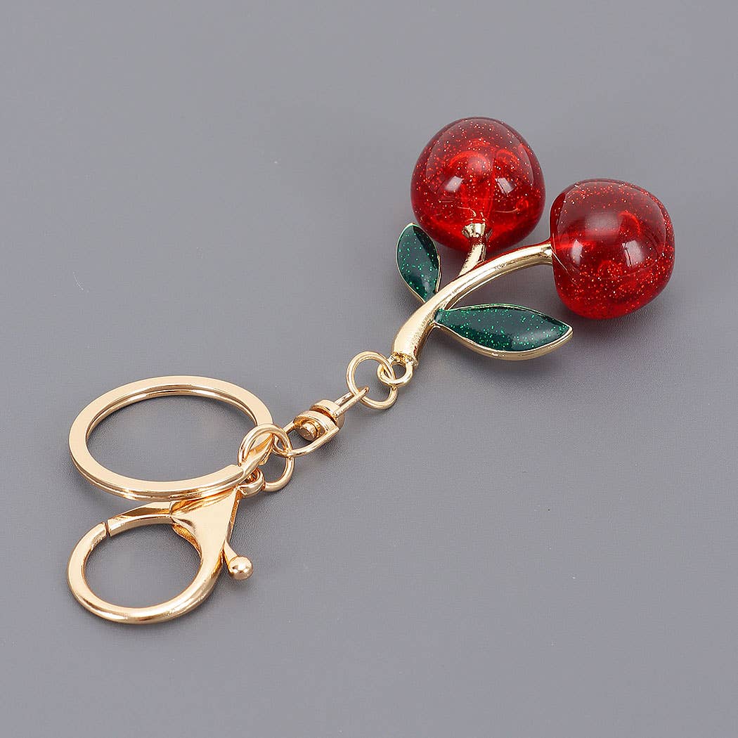 RD Portachiavi con ciondolo a forma di ciliegia smaltata in vendita all'ingrosso su Faire1