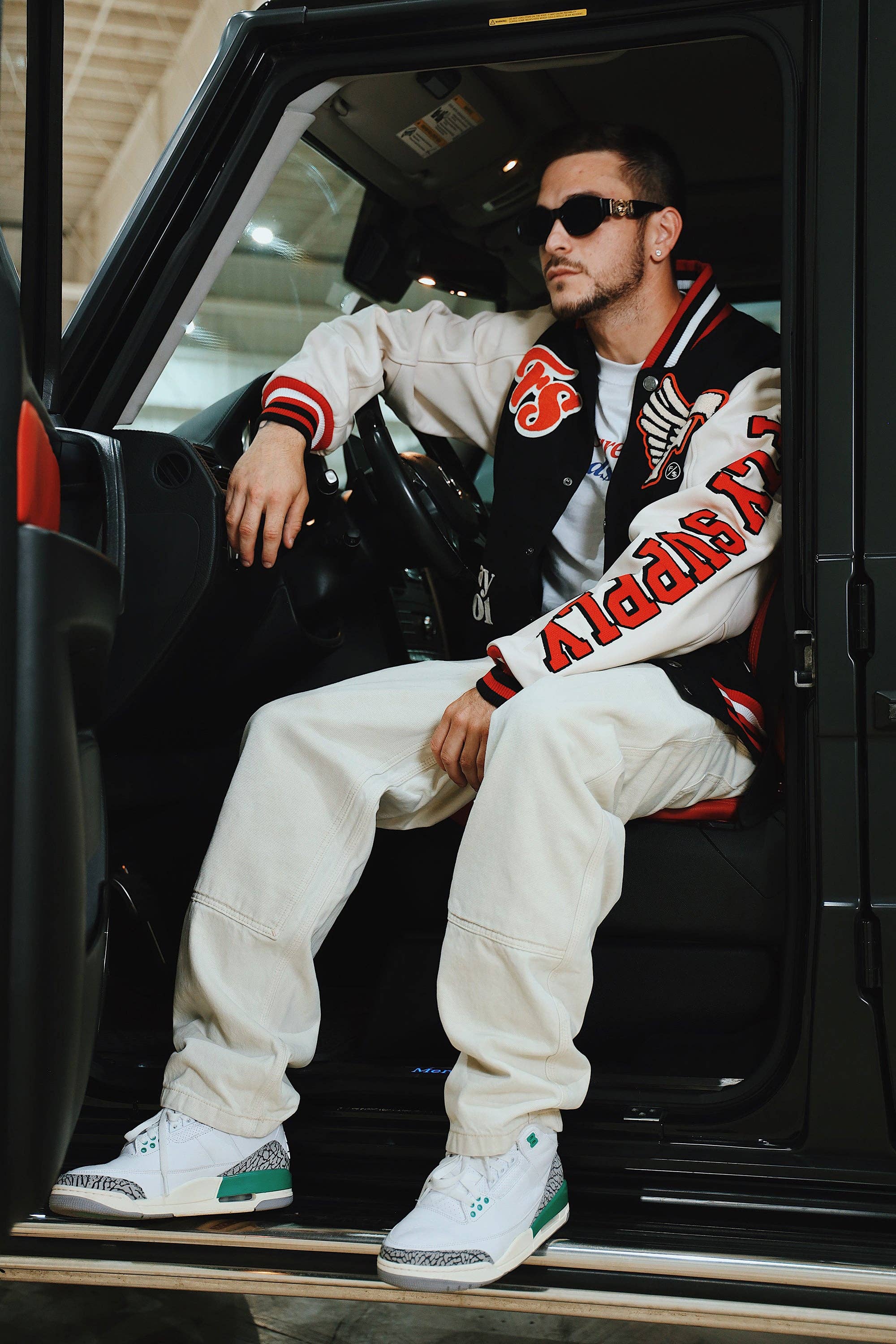 Denim Manifest Varsity Jacket (Black) for wholesale on Faire11