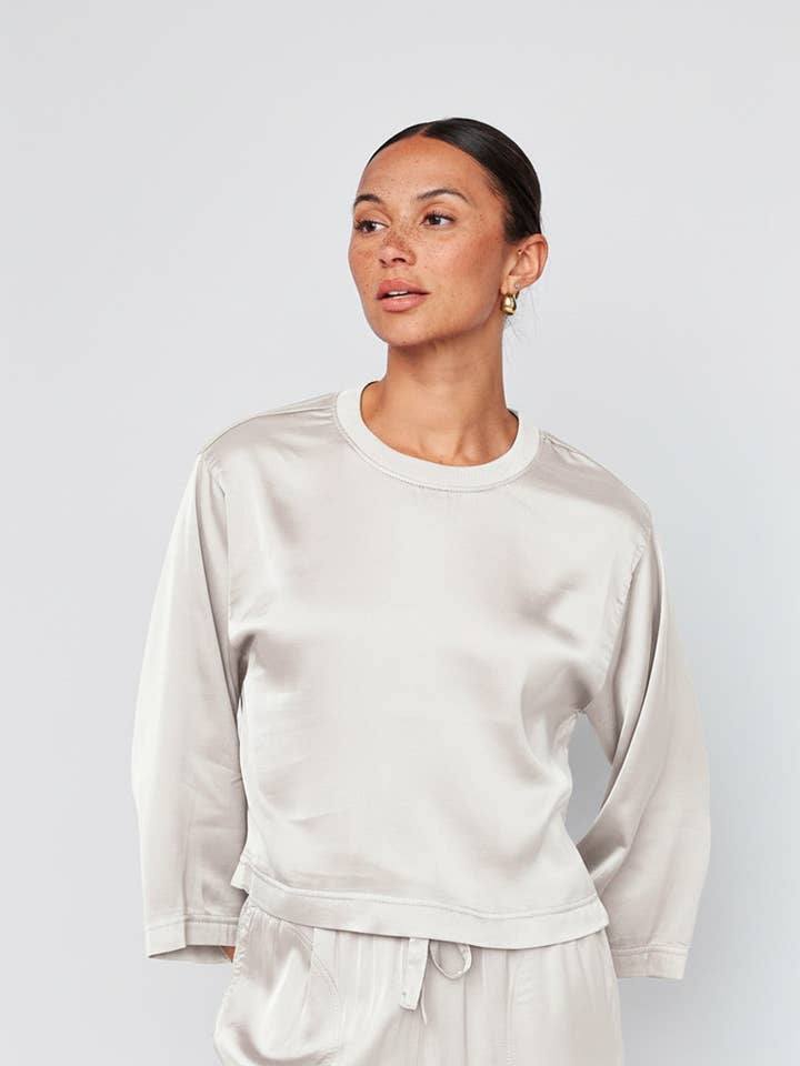 Cosmo Satin Crewneck Top in Cream for wholesale by Stateside