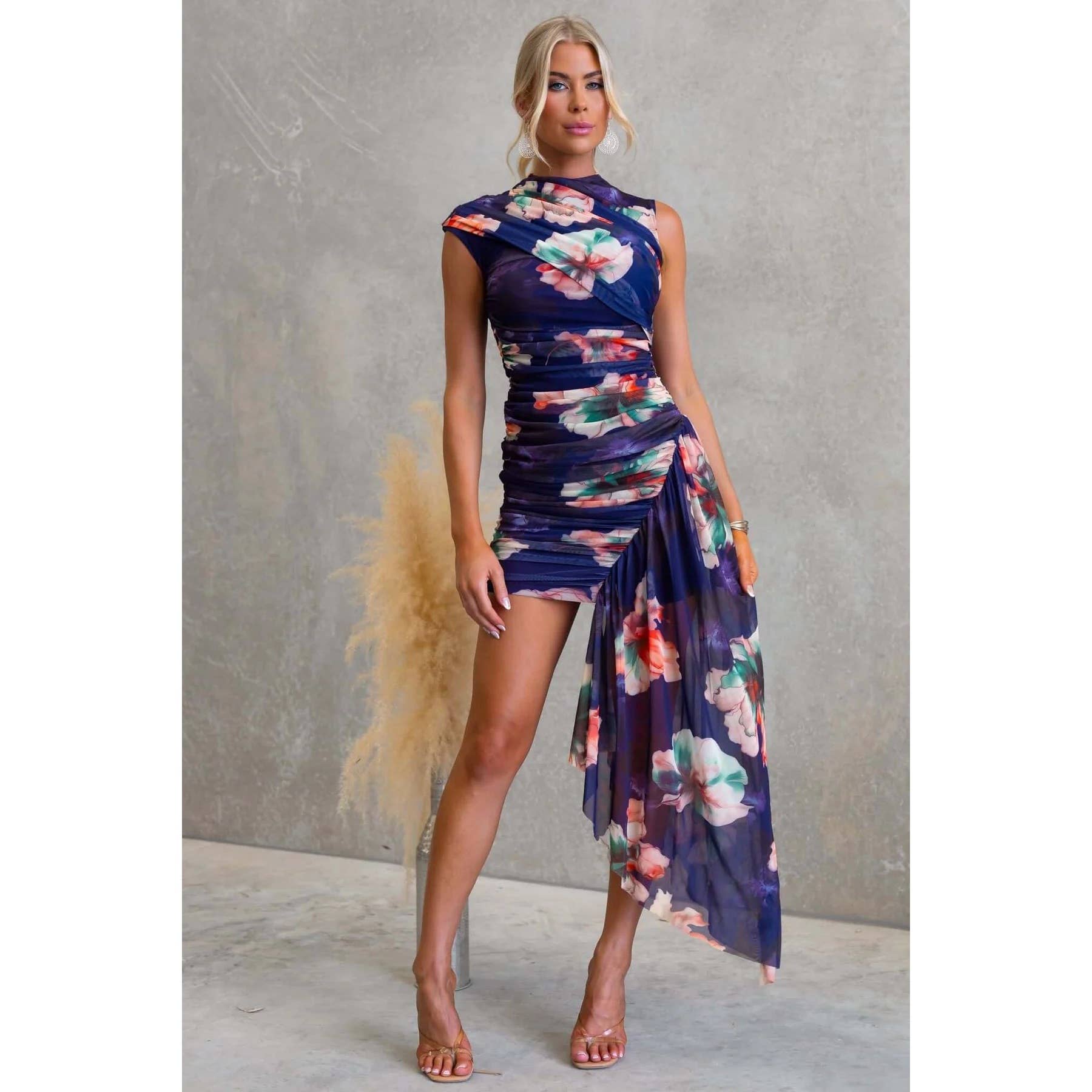ASYMMETRIC FLORAL RUCHED MINI DRESS and other Wholesale ruched for your store trending on Faire.